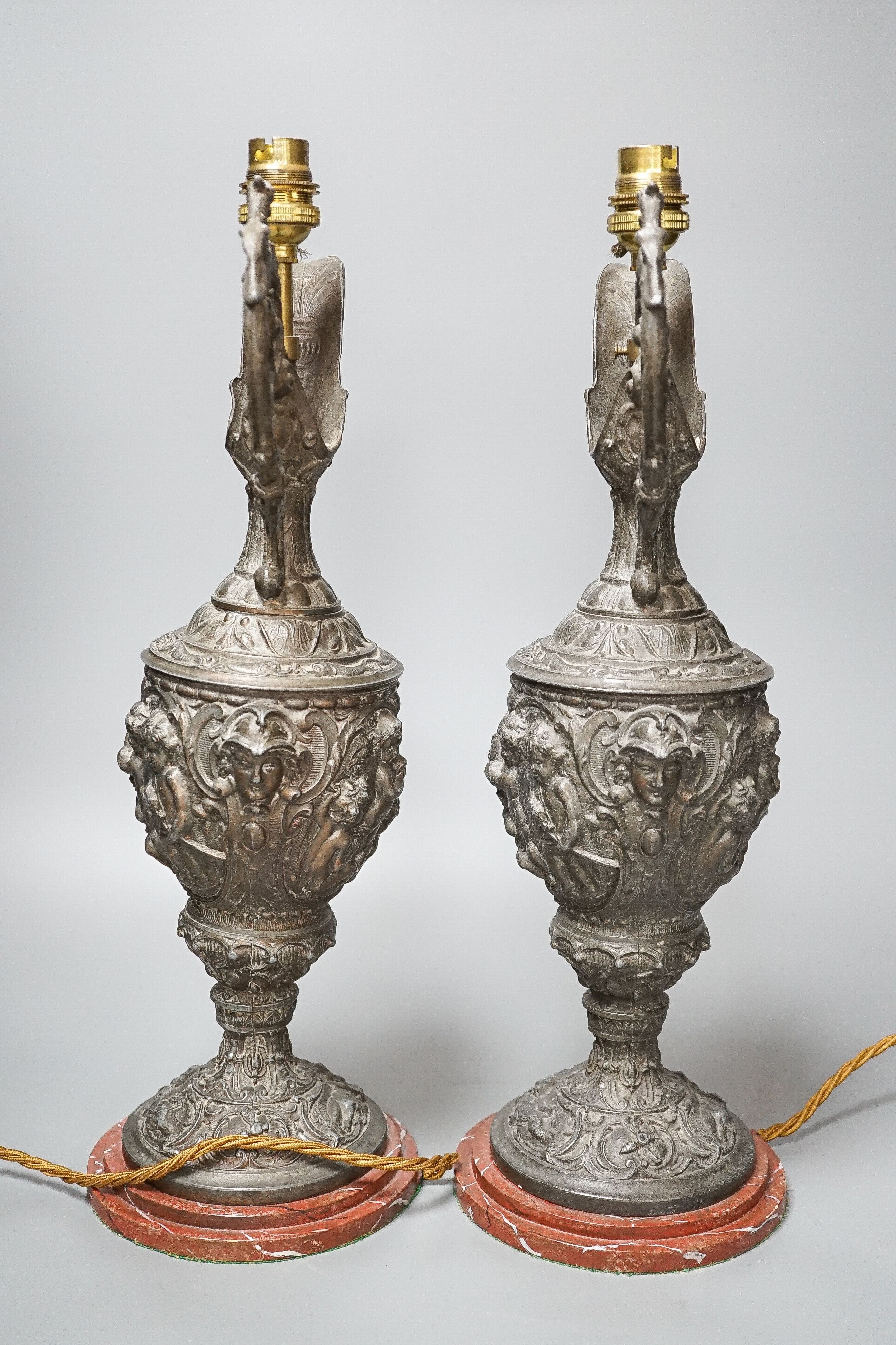 A pair of early 20th century spelter ewers mounted as lamps 42cm